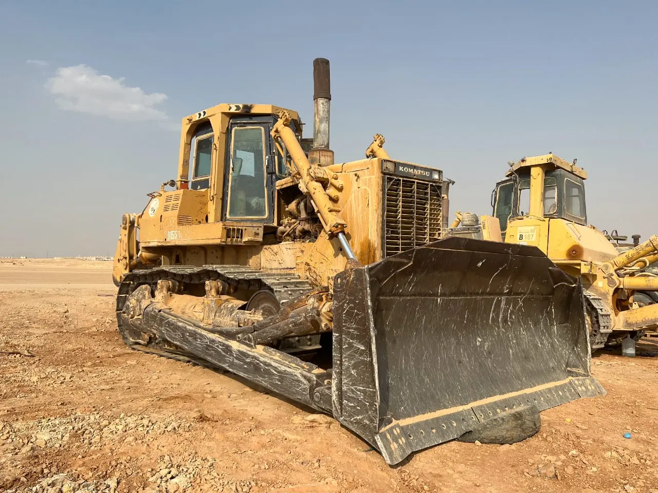 4 komatsu 375 and 2 komatsu 155