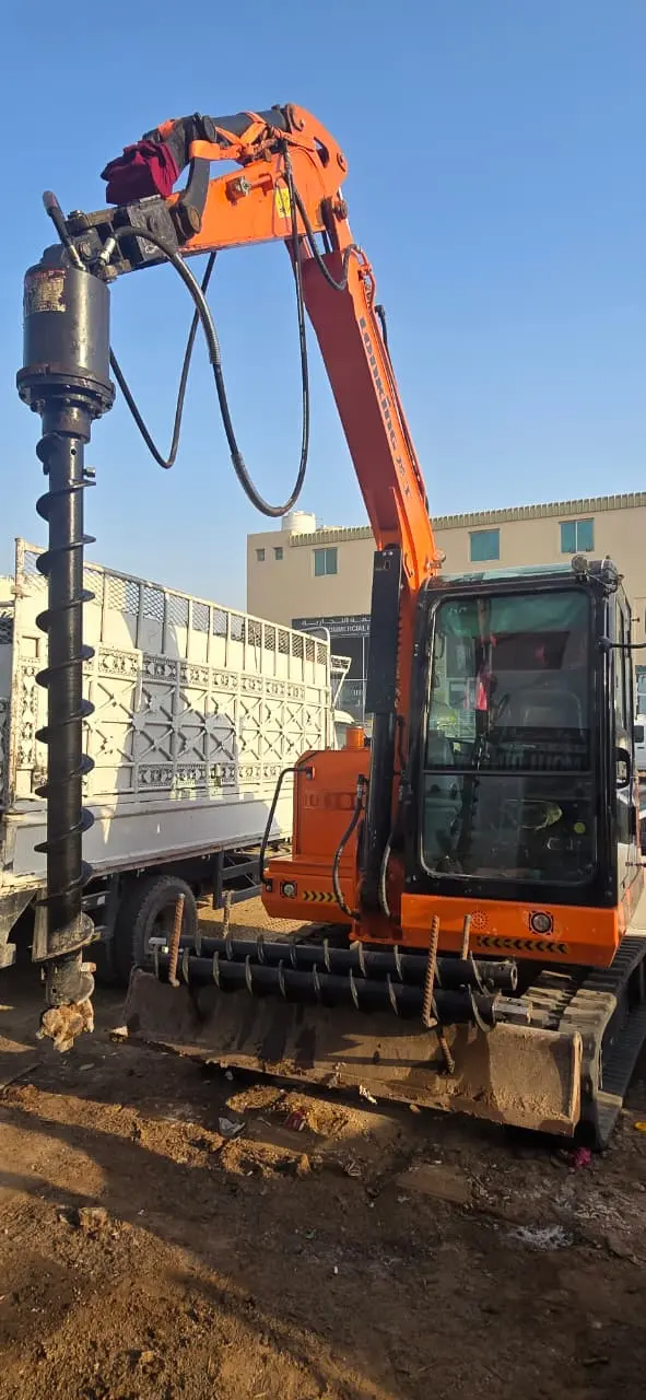 Tracked Excavator with Auger Attachment for Rent